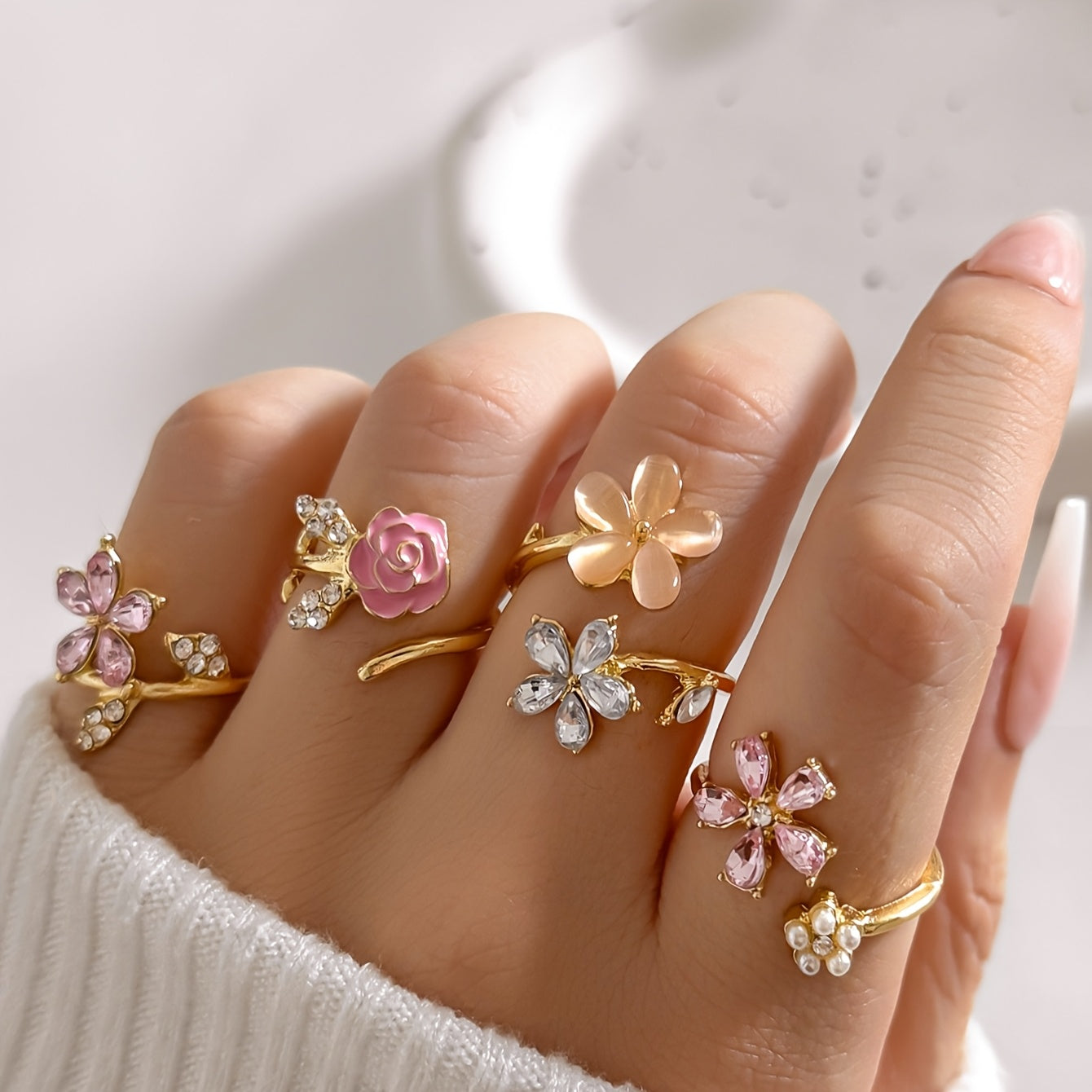 Set van ringen van een legering met diamanten en parels