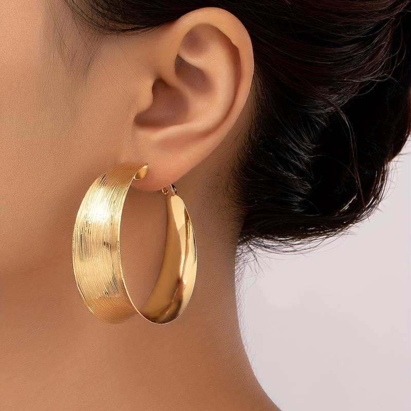 Vintage openwork gold hoop earrings