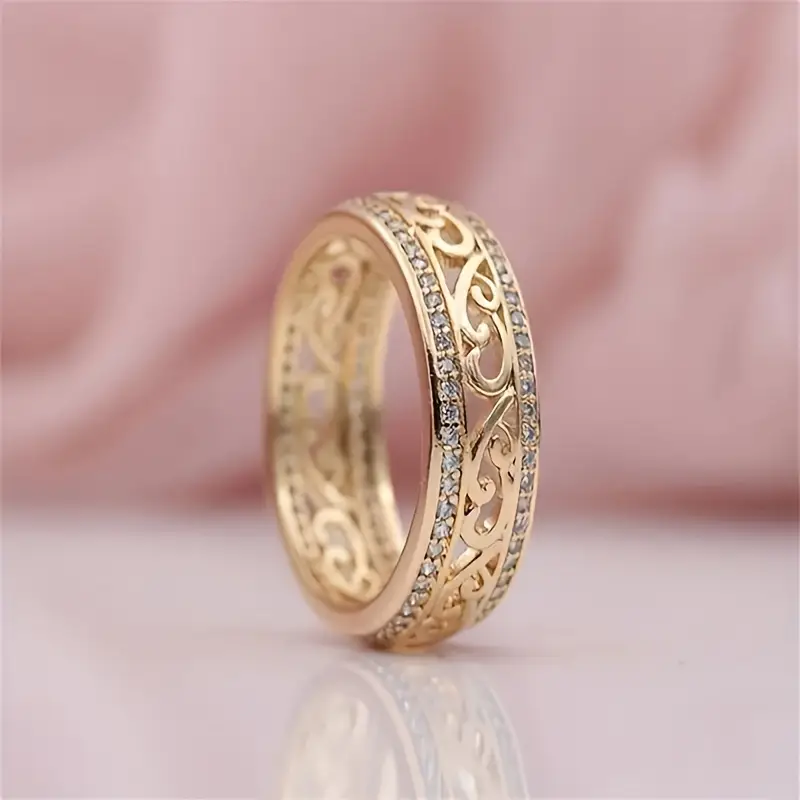 Shiny openwork gold ring