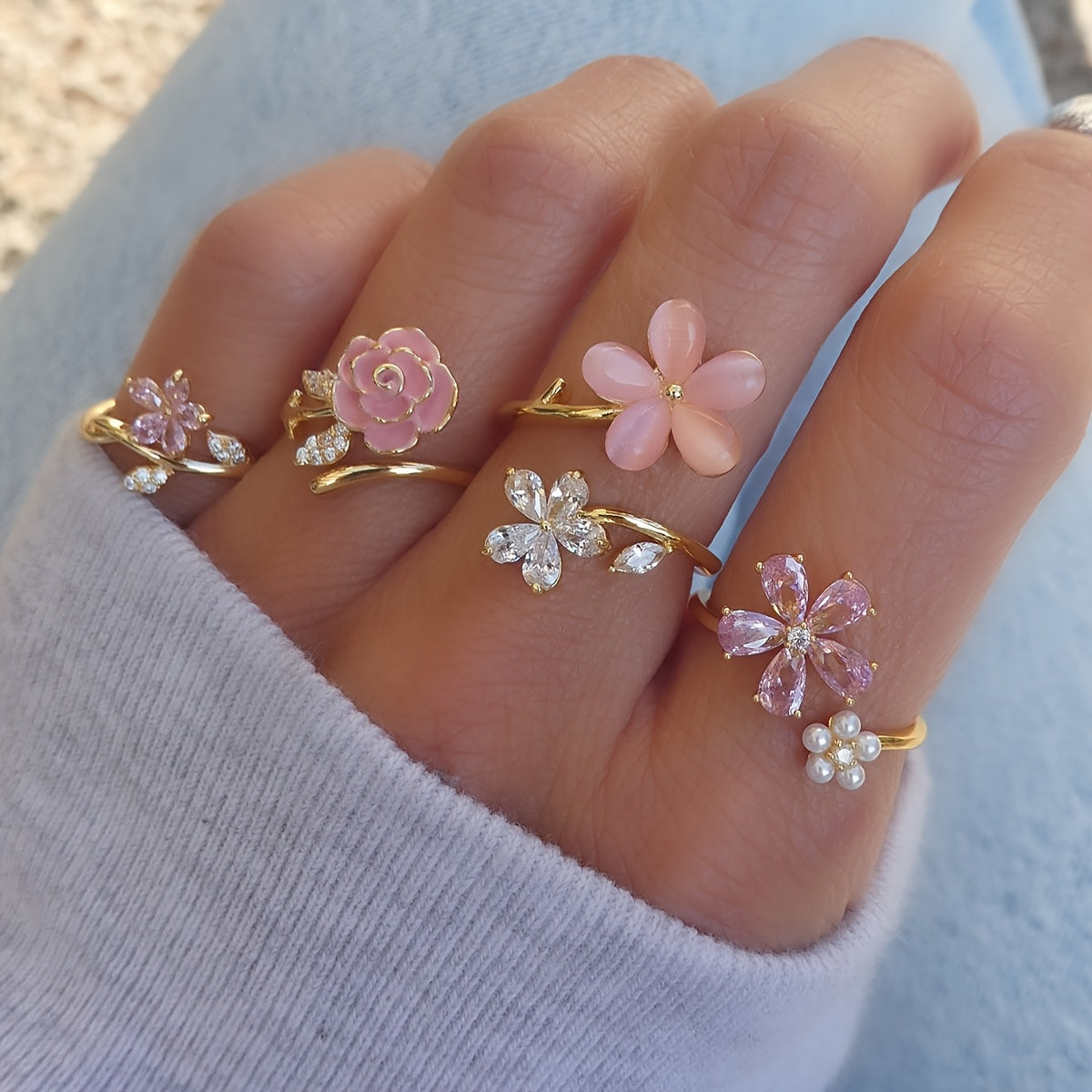 Set van ringen van een legering met diamanten en parels